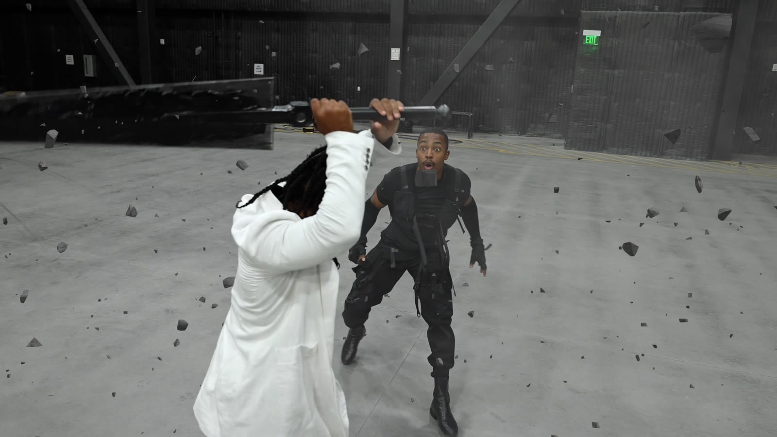 A giant blade swung through floating debris, from the Black Torch fight made with Crunchyroll and @dance10fikshun, VFX by Andrew Ogonji of Nataka Inc